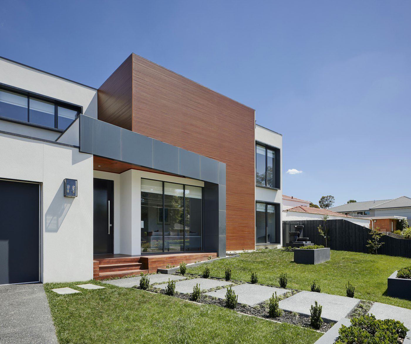 Contemporary residence with warm stone