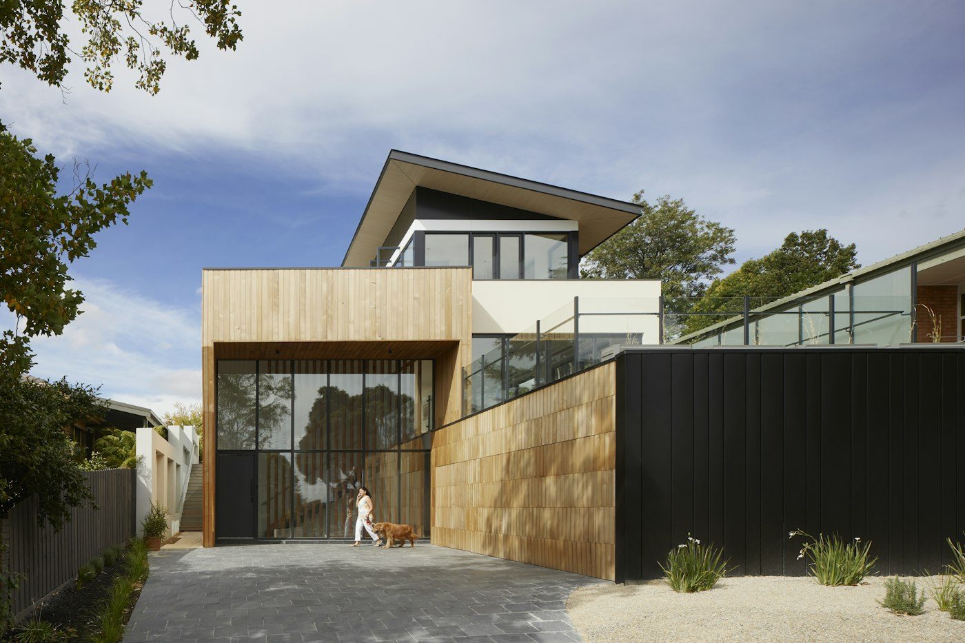 Desert-modern home exterior with warm materials